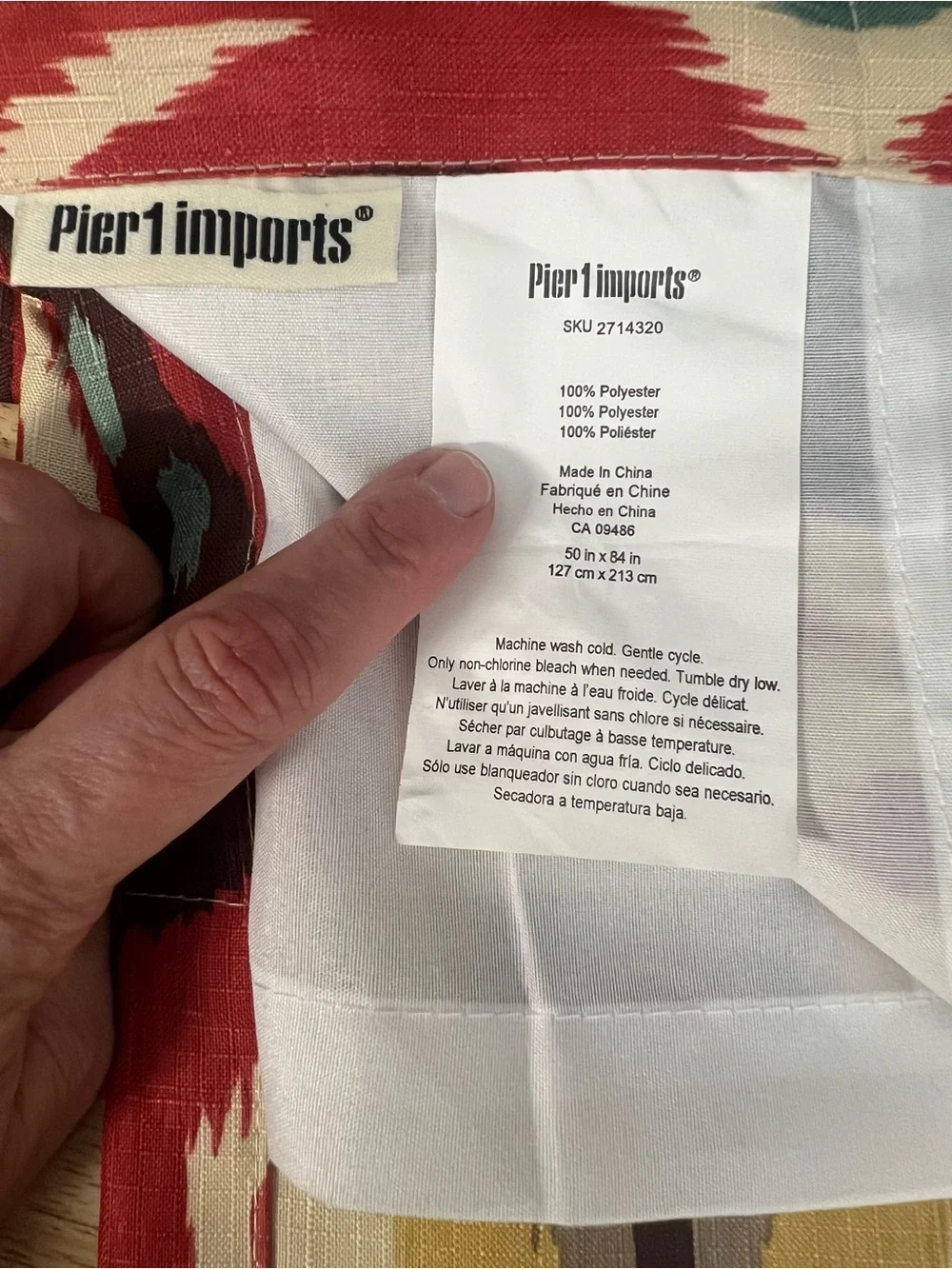 Pier 1 Imports pair of Patterned brass Grommet IKAT Curtain Panels 50” X 84”